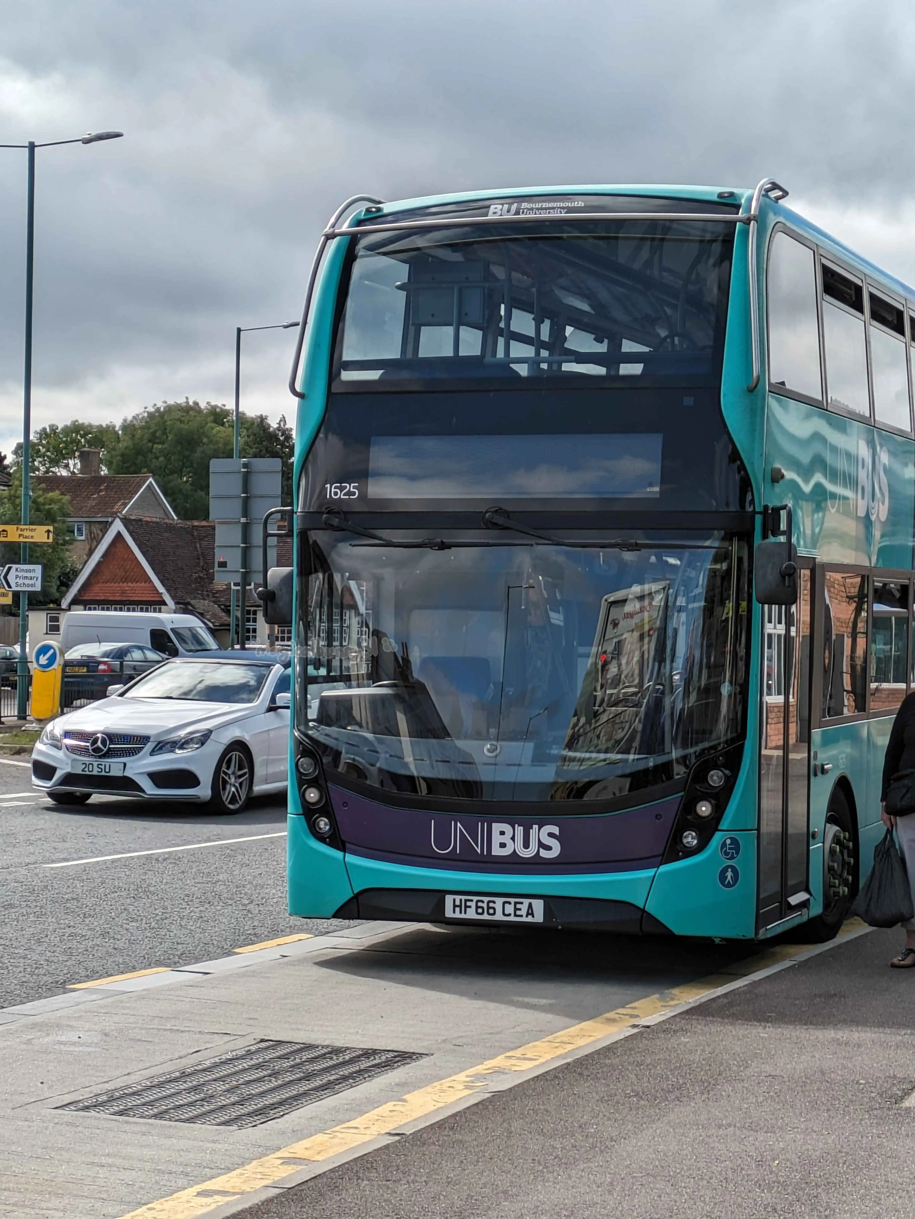 ADL Enviro400 MMC with registration HF66 CEA from morebus in UNIBUS Teal livery at Kinson Library